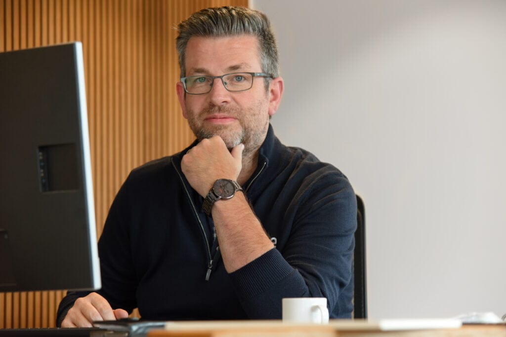 Calculator Bert aan het werk bij Tifre